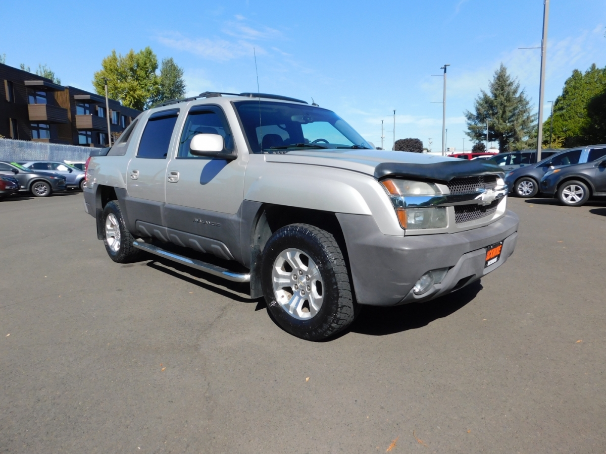 Silver 2004 Chevrolet Avalanche Pickup Truck Four-Wheel Drive Automatic